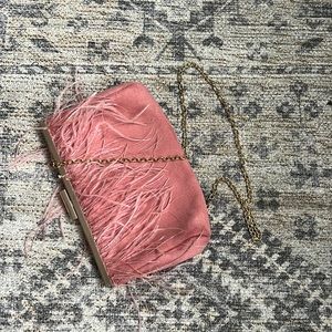 Pink crossbody bag with feather detail